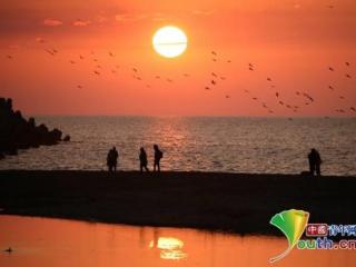 太阳图片唯美（俄罗斯索契河上太阳西沉）