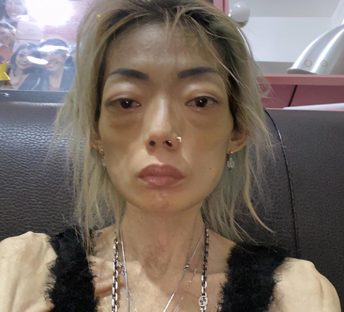 伍智恒年轻时图片伍智恒久违露面买鱼蛋